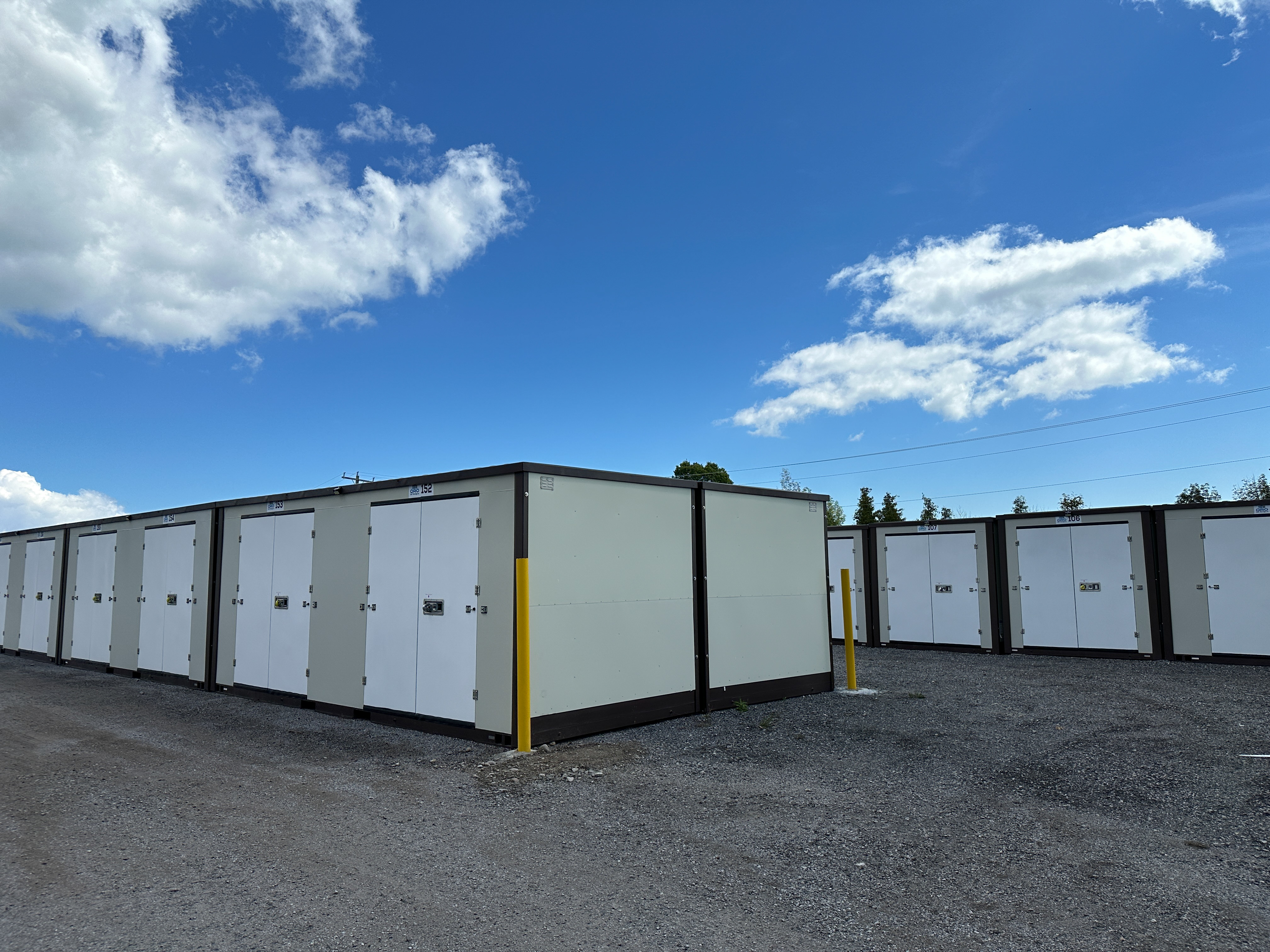 Rows of secure drive-up storage units with 24/7 access
